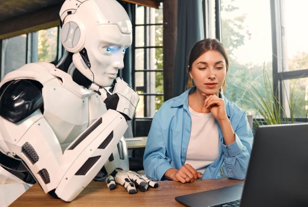 A robot helps a business woman automate her bookkeeping