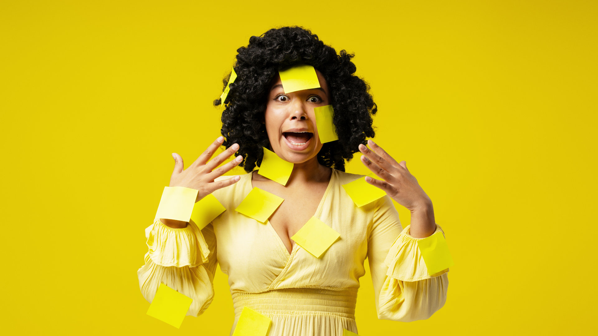 A woman with post-it-notes symbolising mistakes