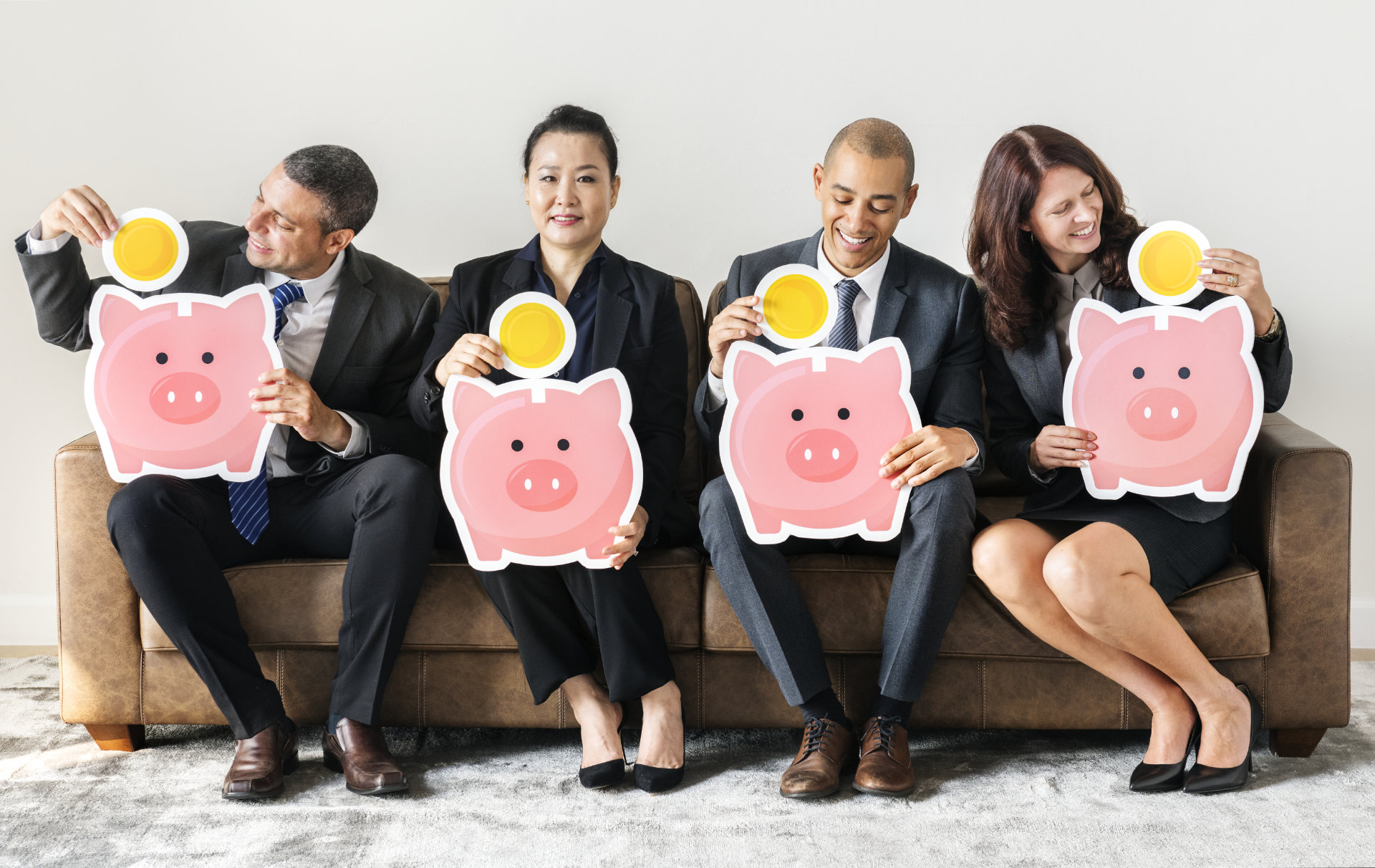 Business people sitting together with icons